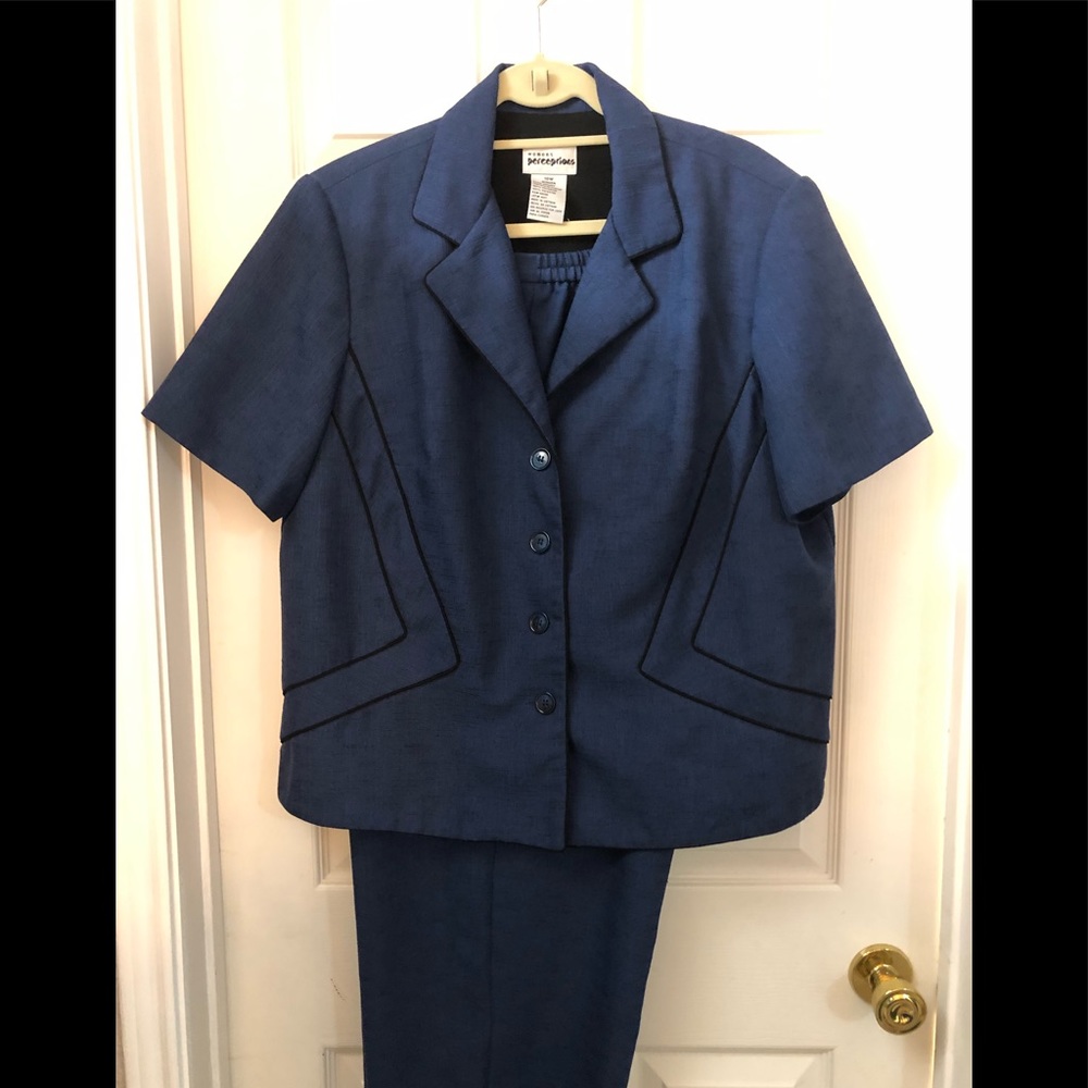 Perceptions two piece women’s blue with black pipeing trim.